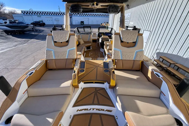 Slide: The Image of 2026 Nautique Super Air Nautique G25 Paragon boat interior with luxurious seating. - 9