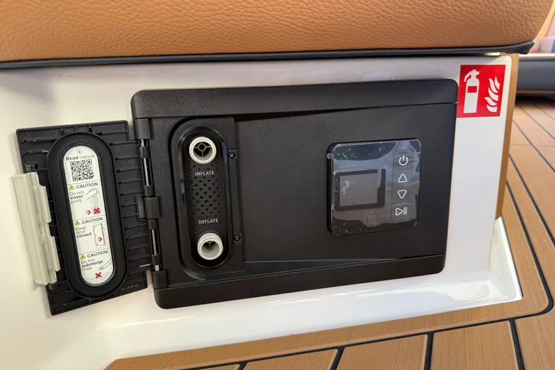 Slide: The Image of Control panel of 2026 Nautique Super Air Nautique G25 with inflate and deflate options. - 28