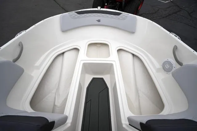 Slide: The Image of 2026 Bayliner M17 boat interior with seating and storage compartments. - 9