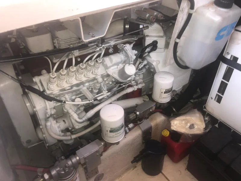 Slide: The Image of Engine compartment of a 2001 Maxum 4100 SCA boat, showcasing mechanical components. - 48