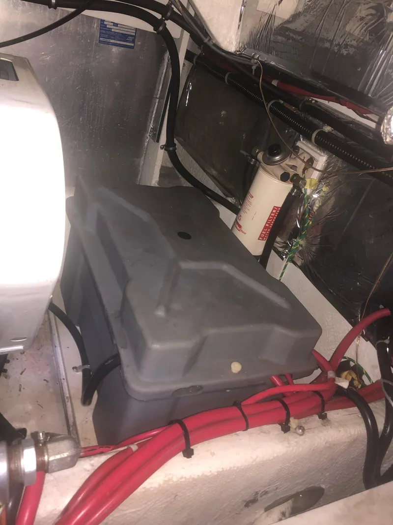 Slide: The Image of Engine compartment of 2001 Maxum 4100 SCA with battery and wiring. - 51