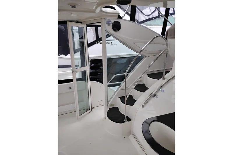 Slide: The Image of Interior view of 2001 Maxum 4100 SCA yacht with stairs and glass door. - 9