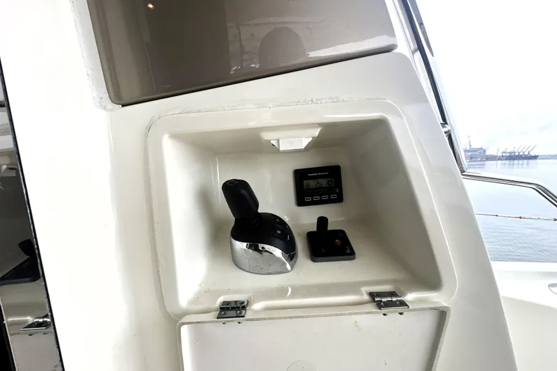 Slide: The Image of Control panel of a 2017 Prestige 500 yacht with joystick and display. - 14