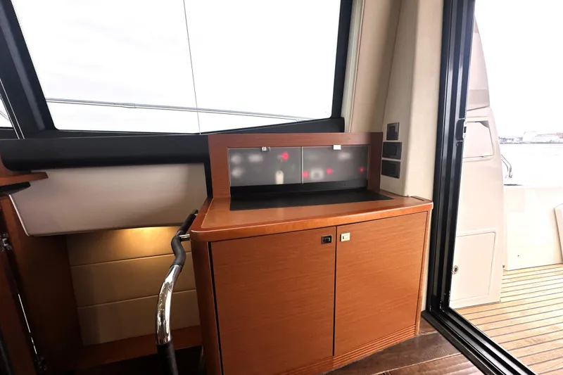 Slide: The Image of Interior of 2017 Prestige 500 yacht with wooden cabinetry and modern design elements. - 31