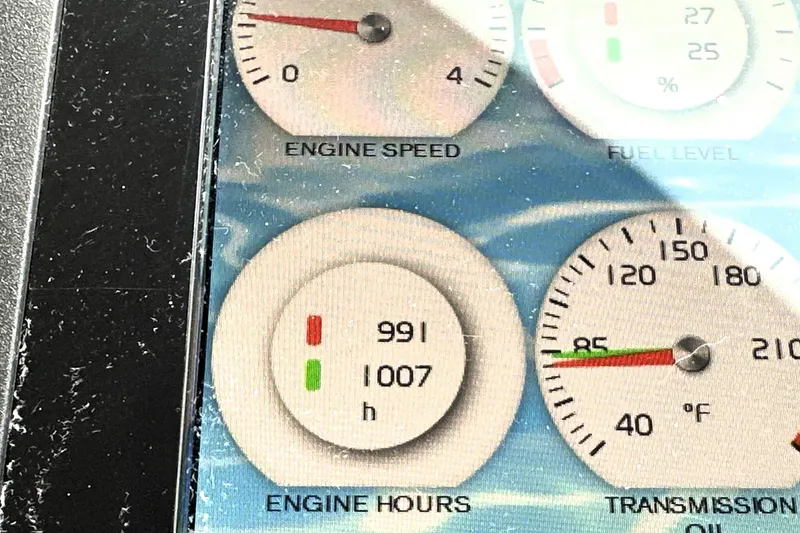 Slide: The Image of Dashboard gauges of a 2017 Prestige 500, showing engine speed and hours. - 50