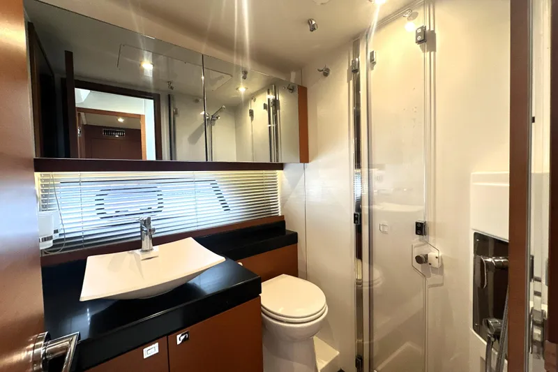 Slide: The Image of Luxurious bathroom in 2017 Prestige 500 yacht with modern fixtures and elegant design. - 56