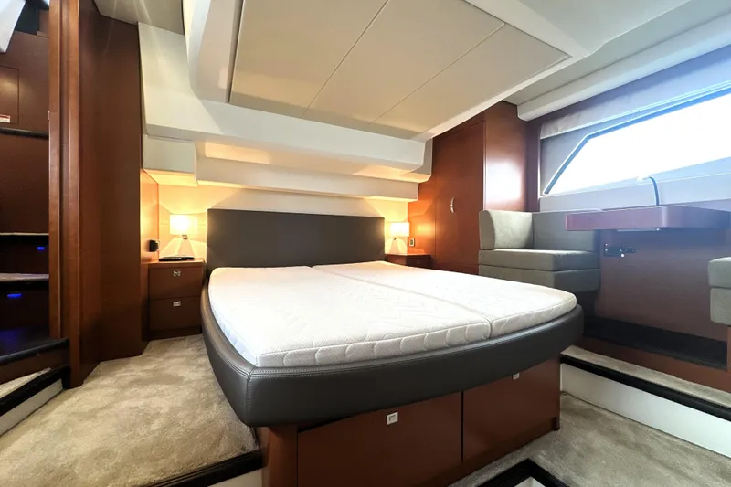 Slide: The Image of Luxurious 2017 Prestige 500 yacht bedroom with modern design and elegant furnishings. - 63