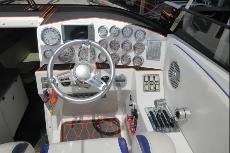 Slide: The Image of Cockpit of 2013 Nordic 39 POKER RUN boat with gauges and steering wheel. - 10