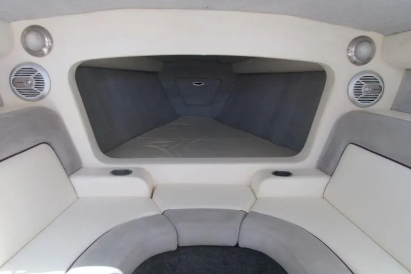 Slide: The Image of Interior of 2013 Nordic 39 POKER RUN boat with cushioned seating and speakers. - 12