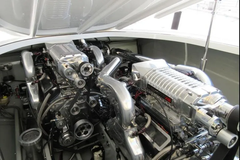 Slide: The Image of Engine compartment of 2013 Nordic 39 POKER RUN boat, showcasing powerful dual engines. - 3