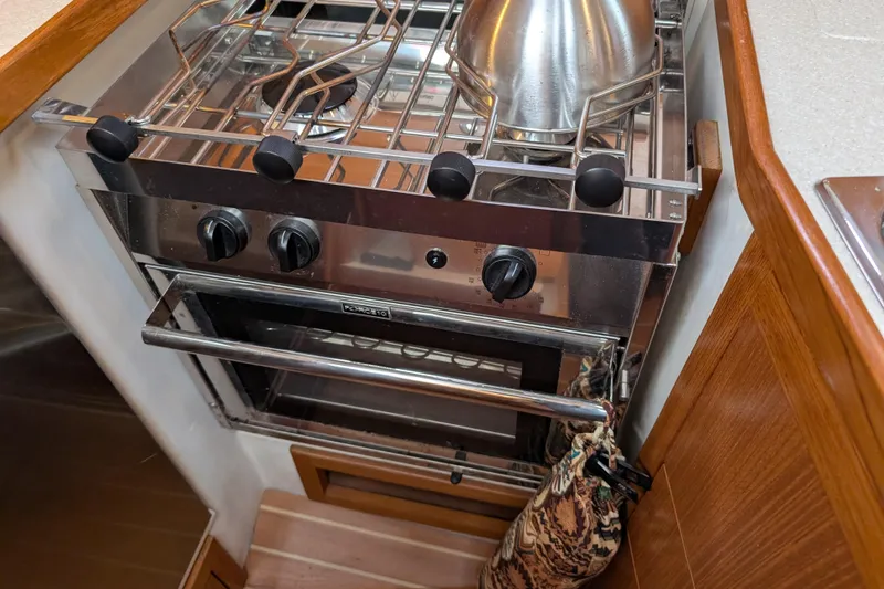 Slide: The Image of Stainless steel stove and oven in 2021 Catalina 315 yacht kitchen. - 14