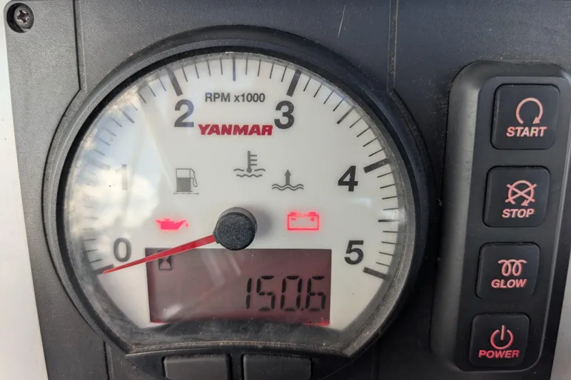 Slide: The Image of Bow of 2021 Catalina 315 sailboat docked in a serene marina setting. - 41