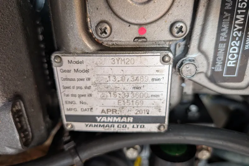 Slide: The Image of Engine compartment of a 2021 Catalina 315 sailboat, featuring Yanmar components. - 55