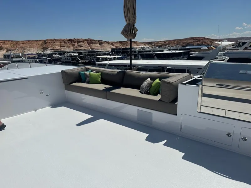 Slide: The Image of Luxury yacht deck with sofa and cushions, Adonia Meticulous Trip 2023. - 18