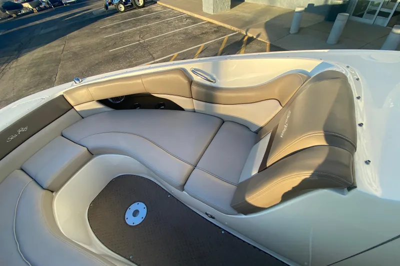 Slide: The Image of Luxurious seating on 2012 Sea Ray 300 SLX boat, featuring elegant beige upholstery. - 36