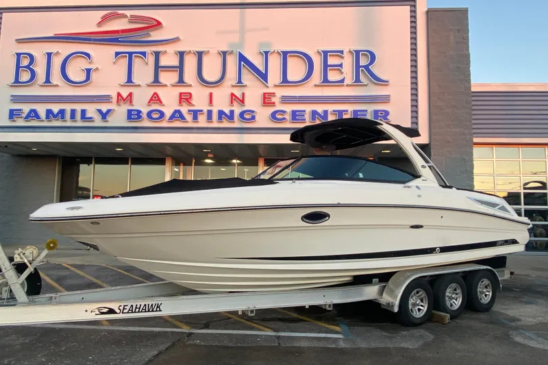 Slide: The Image of 2012 Sea Ray 300 SLX boat on trailer at Big Thunder Marine center. - 40