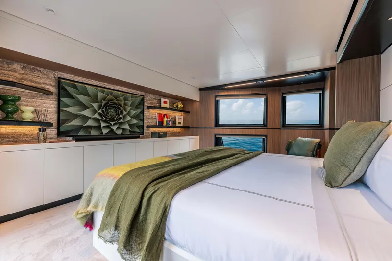 Slide: The Image of Luxurious bedroom interior in 2025 Alpha 100 Squalo Co Ownership yacht, featuring modern design. - 28