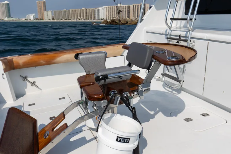 Slide: The Image of Hatteras 60 Convertible 2003 with fishing chair and Yeti bucket on deck. - 11
