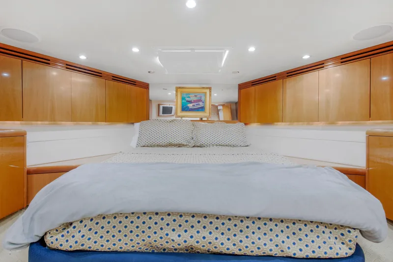 Slide: The Image of Luxurious bedroom on a 2003 Hatteras 60 Convertible yacht. - 45