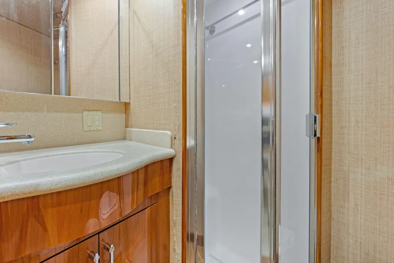 Slide: The Image of Bathroom in Hatteras 60 Convertible 2003 yacht model. - 48