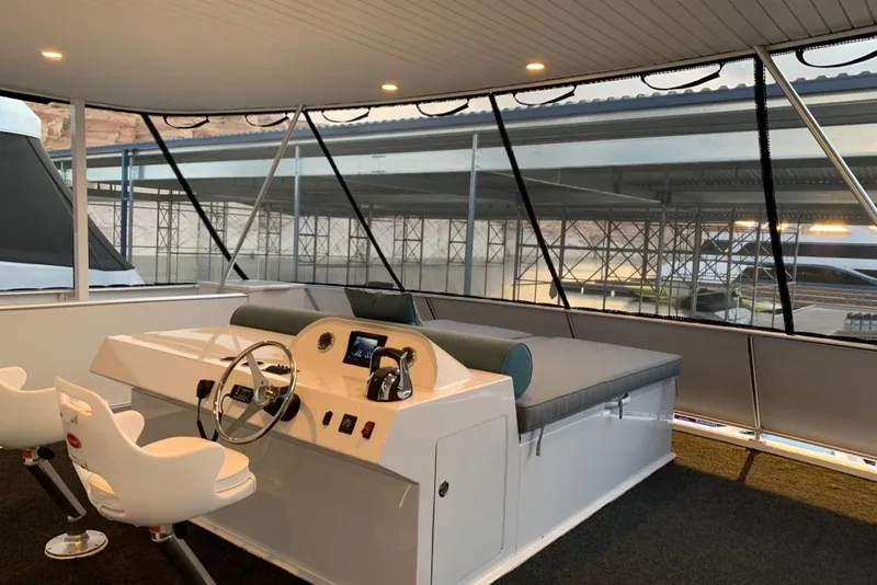 Slide: The Image of Helm of Adonia Utopia Trip #8, 2019, featuring modern controls and seating. - 16