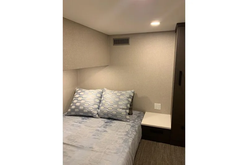 Slide: The Image of Cozy bedroom interior in Adonia Utopia Trip #8, featuring modern decor and soft lighting. - 8