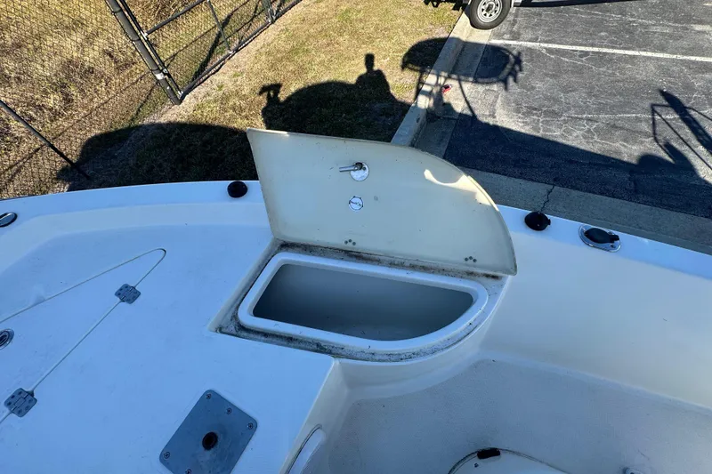 Slide: The Image of 2015 NauticStar 1810 NauticBay boat with open storage compartment on deck. - 8