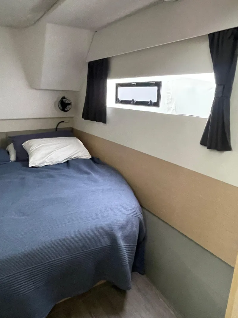 Slide: The Image of 2018 Fountaine Pajot MY 37 cabin with bed, window, and curtains. - 23