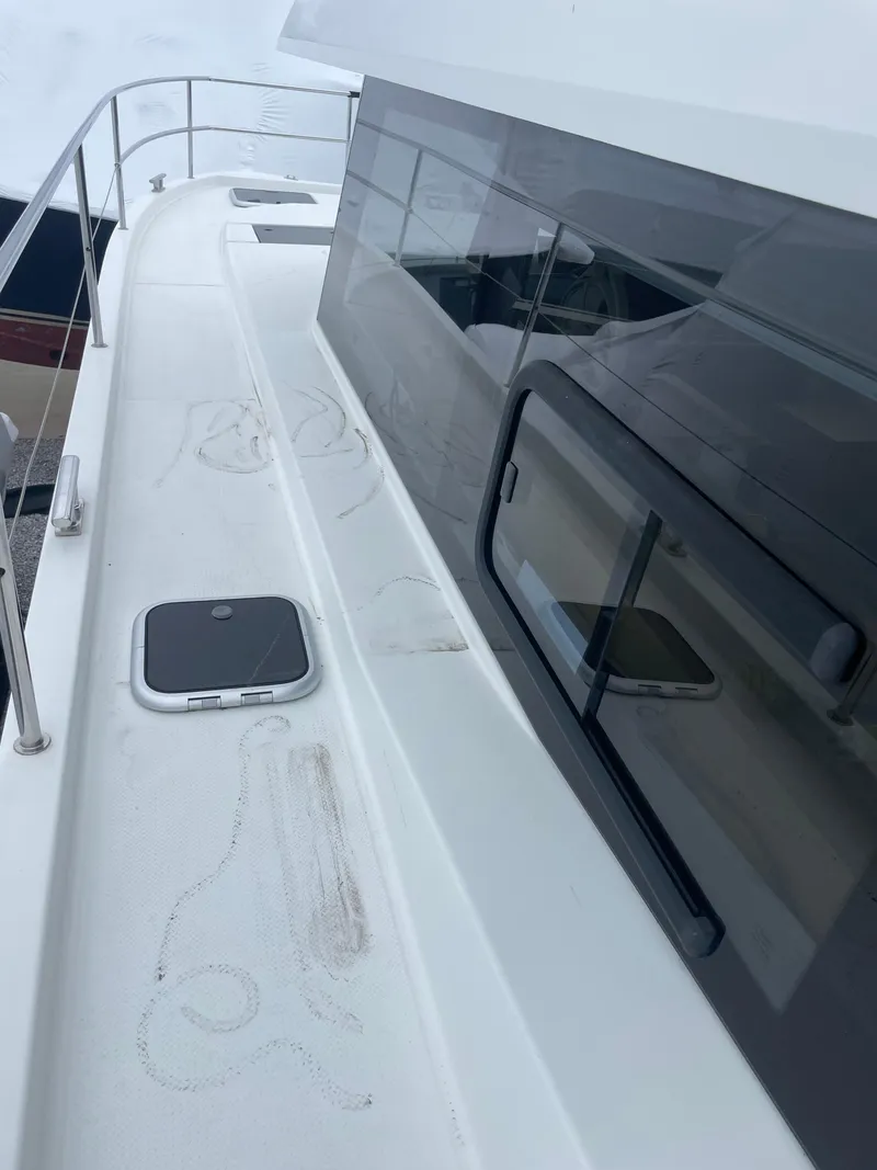 Slide: The Image of 2018 Fountaine Pajot MY 37 yacht deck with sleek design and modern features. - 31