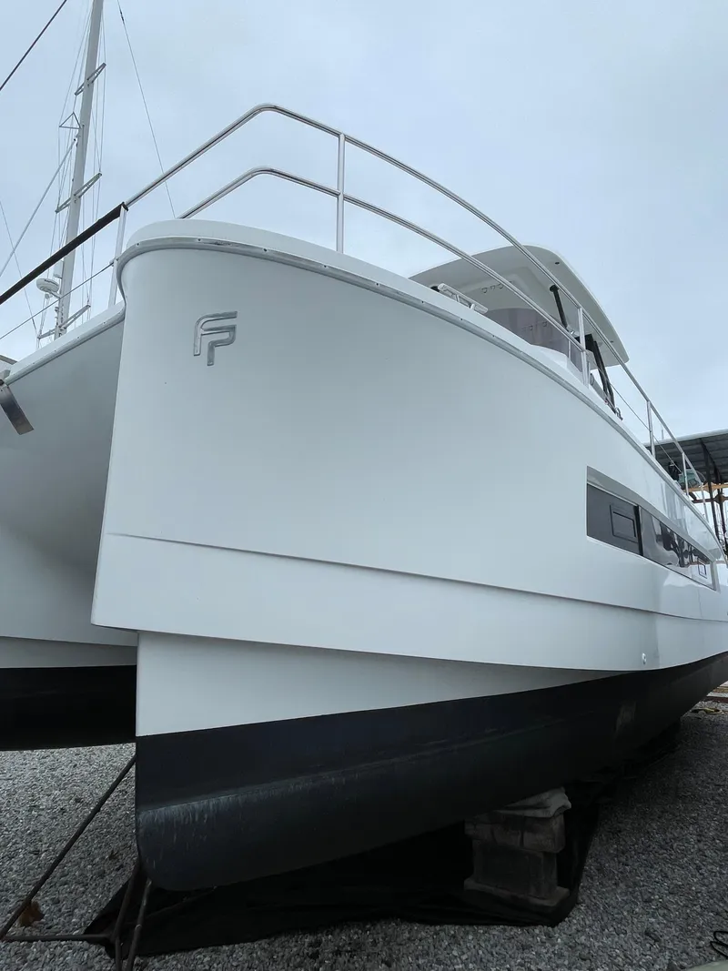 Slide: The Image of 2018 Fountaine Pajot MY 37 yacht on dry dock, side view. - 6