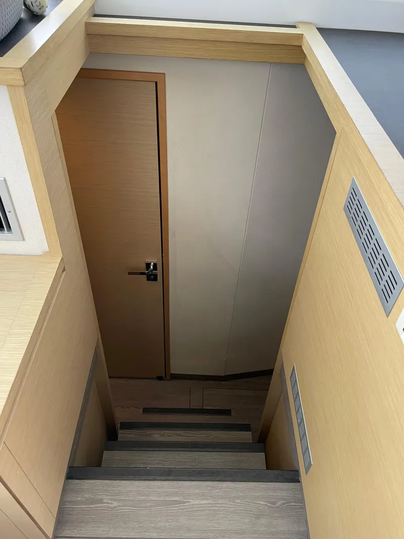Slide: The Image of Staircase leading to lower deck on 2018 Fountaine Pajot MY 37 yacht. - 9