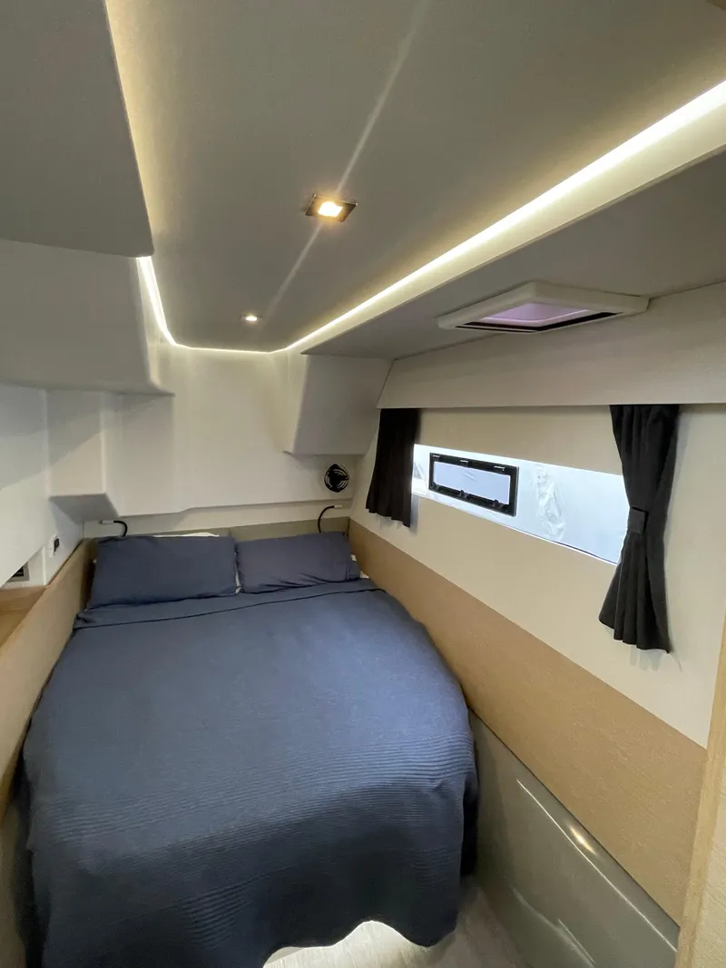 Slide: The Image of 2018 Fountaine Pajot MY 37 cabin with modern design and cozy bedding. - 17