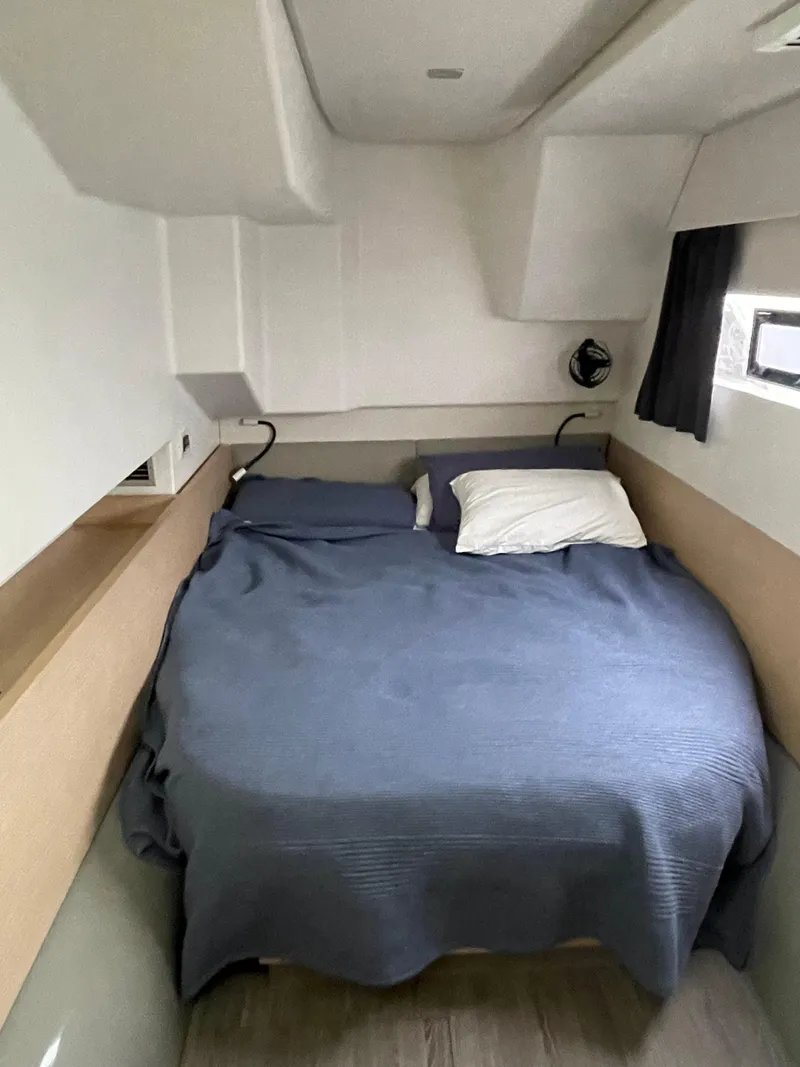 Slide: The Image of Cozy bedroom in 2018 Fountaine Pajot MY 37 yacht with blue bedding. - 24