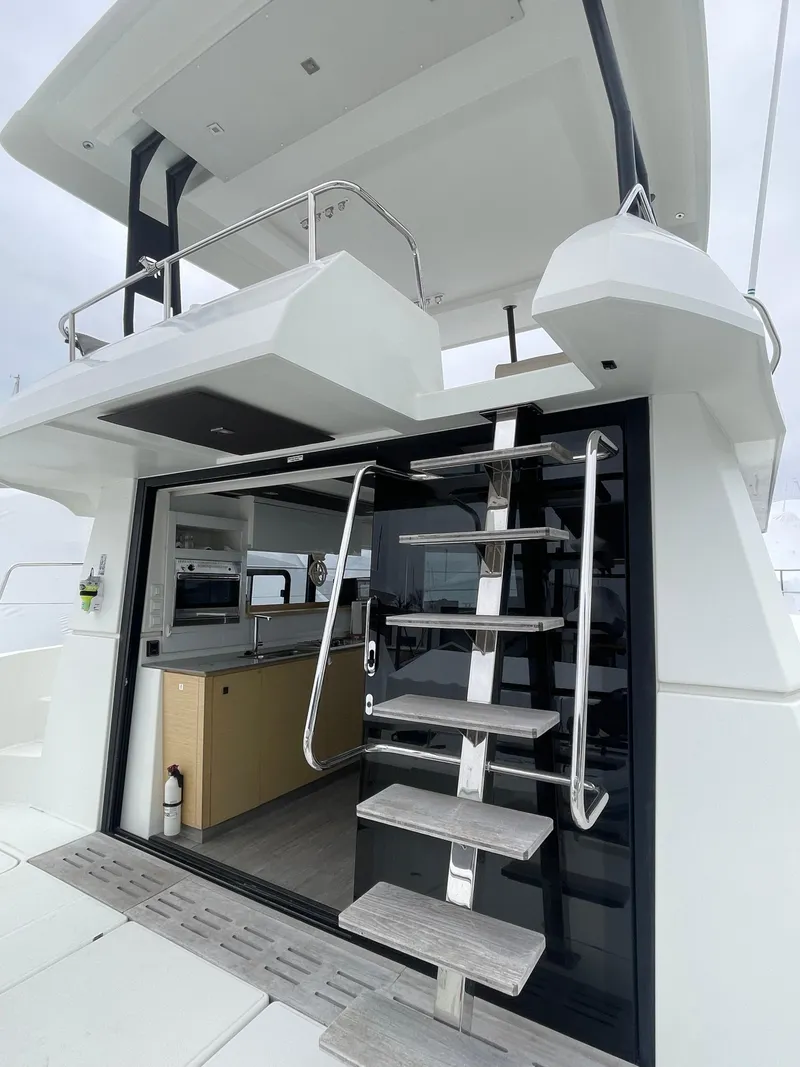 Slide: The Image of 2018 Fountaine Pajot MY 37 yacht with modern interior and sleek exterior design. - 25