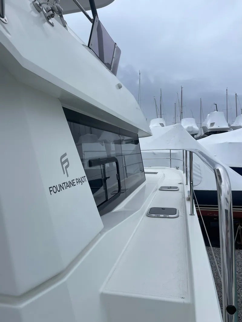 Slide: The Image of 2018 Fountaine Pajot MY 37 yacht docked, showcasing sleek design and modern features. - 26