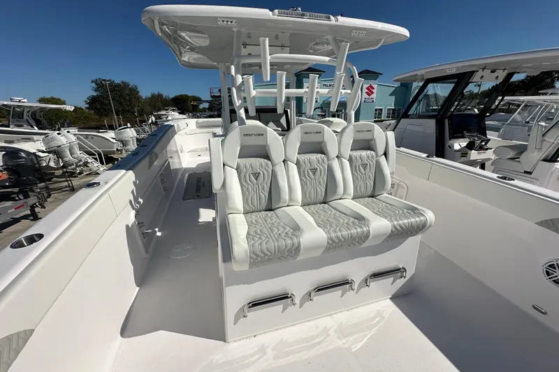 Slide: The Image of 2026 Twin Vee 340 GFX CC boat with sleek seating and modern design. - 15