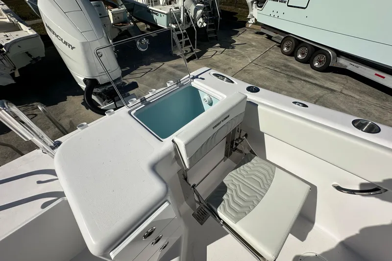 Slide: The Image of 2026 Twin Vee 340 GFX CC boat interior with seating and storage features. - 16