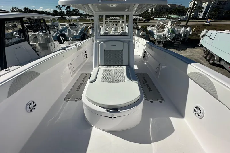 Slide: The Image of 2026 Twin Vee 340 GFX CC boat interior, showcasing sleek seating and modern design. - 9
