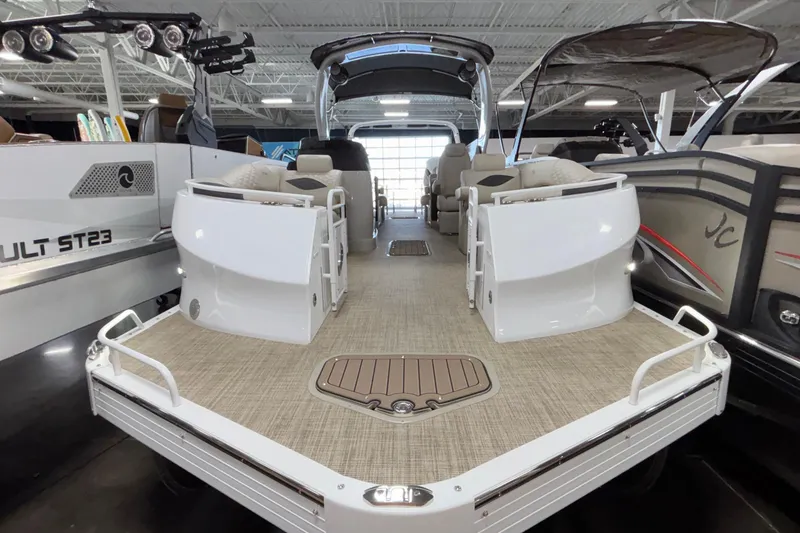 Slide: The Image of 2026 JC Sporttoon 26TT pontoon boat interior with seating and modern design. - 10