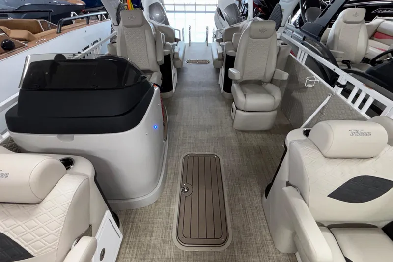 Slide: The Image of 2026 JC Sporttoon 26TT pontoon boat interior with luxurious seating and modern design. - 13