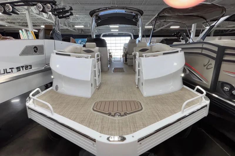 Slide: The Image of 2026 JC Sporttoon 26TT pontoon boat interior with spacious deck and seating. - 9