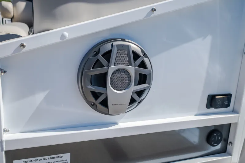 Slide: The Image of Speaker system on JC Sporttoon 26TT boat, 2026 model, featuring Boston Acoustics audio. - 11
