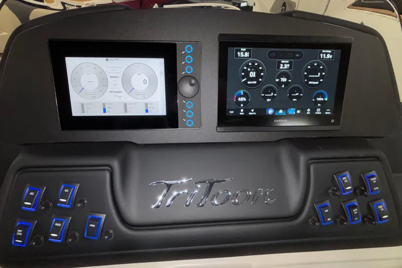 Slide: The Image of Dashboard of 2026 JC Sporttoon 26TT with dual digital displays and control switches. - 19