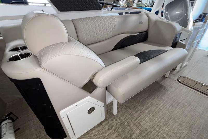 Slide: The Image of Luxurious seating on 2026 JC Sporttoon 26TT boat with quilted upholstery and cup holders. - 21
