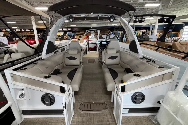 Slide: The Image of 2026 JC Sporttoon 26TT pontoon boat interior with plush seating and modern design. - 27