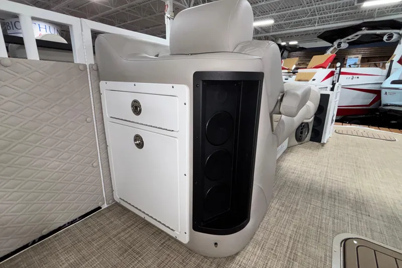Slide: The Image of 2026 JC Sporttoon 26TT boat interior with seating and storage compartments. - 30
