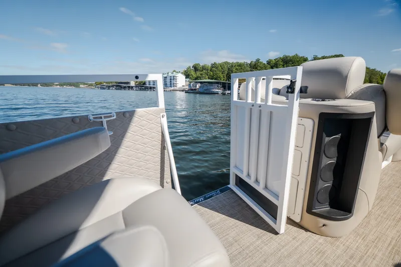 Slide: The Image of Pontoon boat interior with open gate, JC Sporttoon 26TT, 2026 model, on a sunny lake. - 21