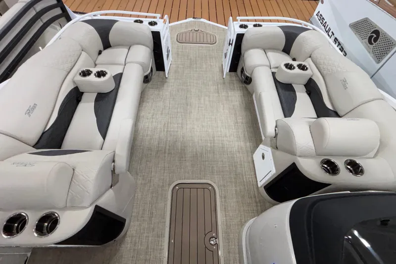 Slide: The Image of Luxurious interior of 2026 JC Sporttoon 26TT pontoon boat with plush seating and cup holders. - 6