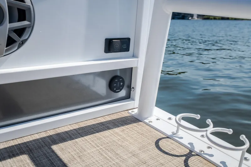 Slide: The Image of Pontoon boat deck with speaker and cup holders, JC Sporttoon 26TT, 2026 model. - 12