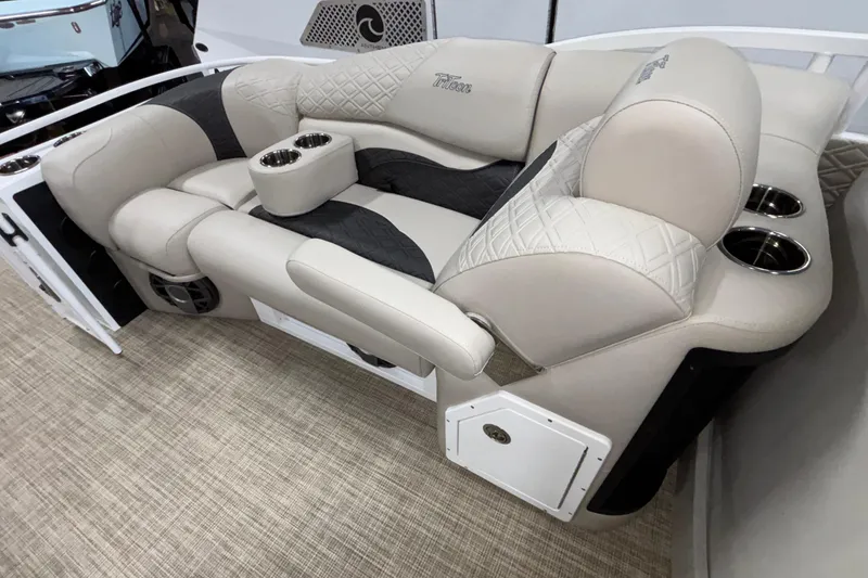 Slide: The Image of Luxurious seating on 2026 JC Sporttoon 26TT boat with cup holders and quilted upholstery. - 8